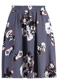 Jupe fleurie avec une taille élastique. Fabriquée en tissu léger et lisse, elle présente un fond gris foncé avec des motifs floraux blancs et orange.