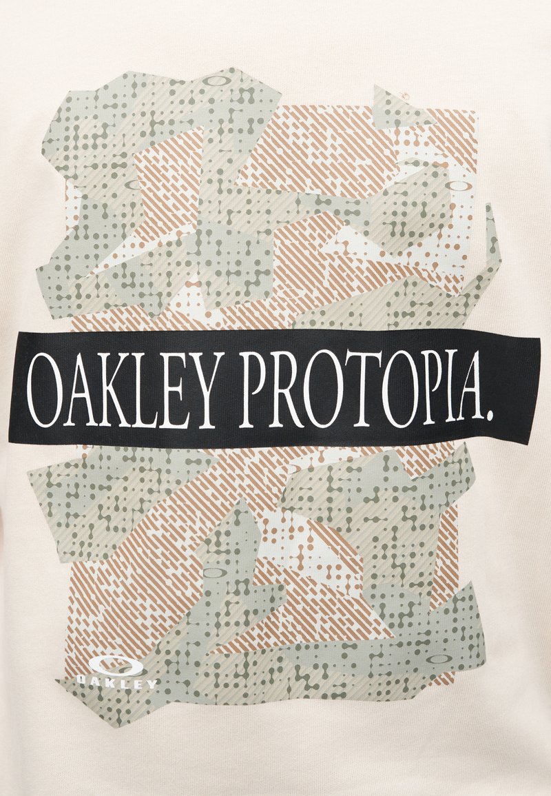Abstract geometric shapes in beige and brown with a black rectangle containing the text "OAKLEY PROTOPIA" in white letters.