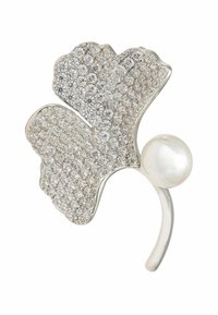 Leaf-shaped ring in silver, adorned with clear crystals and a white pearl detail. Smooth, polished finish with intricate, textured surface.