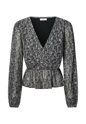 Blouse à motif noir et blanc avec un col en V profond, des manches longues et une taille péplum froncée. Confectionnée dans un tissu léger et transparent.