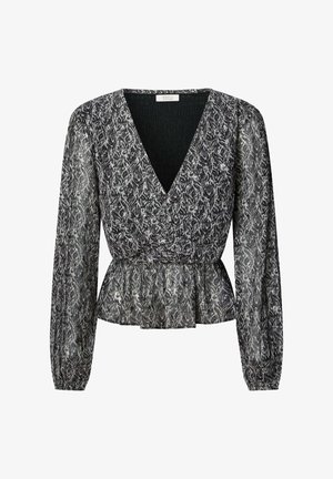 Blouse à motif noir et blanc avec un col en V profond, des manches longues et une taille péplum froncée. Confectionnée dans un tissu léger et transparent.