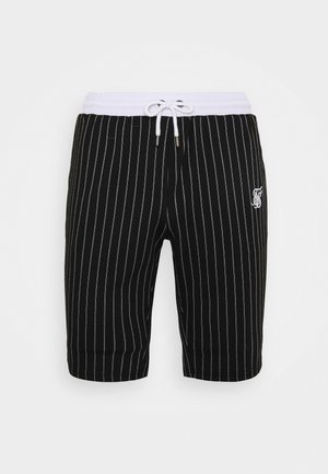 Schwarze Shorts mit weißen vertikalen Nadelstreifen, weißem elastischem Bund mit Kordelzug und kleinem weißem, gesticktem Logo am linken Oberschenkel.