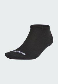 Schwarzes Knöchelsocken aus einem glatten, dehnbaren Material. Verfügt über einen gerippten Bund und ein weißes Logo an der Seite. Aufwändiges Webmuster.