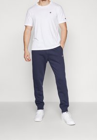 Champion Pantaloni sportivi - dark blue