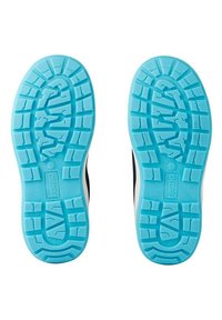 Semelles de chaussures en caoutchouc bleu avec un motif de semelle texturé. Design bicolore avec des accents blancs sur les côtés et une silhouette basse.