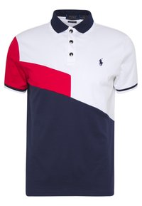 Polo triko s barevným blokem v bílé, červené a tmavě modré barvě. Má límec, zapínání na tři knoflíky a malé logo na hrudi.