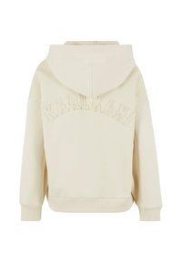 Kapuzensweatshirt aus cremfarbigem Stoff, mit einem strukturierten, gewölbten "KARL KANI" Logo auf der Rückseite. Gerippte Bündchen und Saum, lässiger Schnitt.