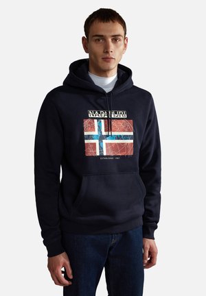 Sudadera azul marino con un gráfico estilizado que presenta la bandera noruega, un logotipo y el texto "Establecida en 1987". Fabricada con material de mezcla de algodón.