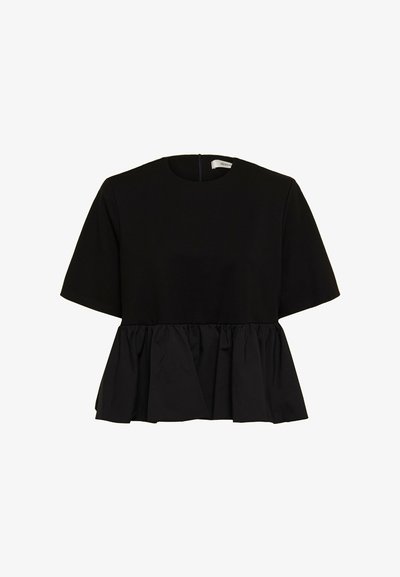 Haut noir à manches courtes avec encolure ronde et bas peplum froncé, fermeture éclair au dos.
