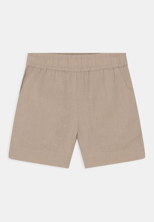 Calções bege feitos de um tecido leve, com uma cintura elástica, dois bolsos laterais e um design limpo e simples.