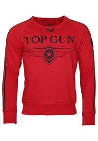 Röd sweatshirt i bomull med svart "TOP GUN"-text och logotyp framtill. Har raglanärmar och svarta ränder längs sidorna.