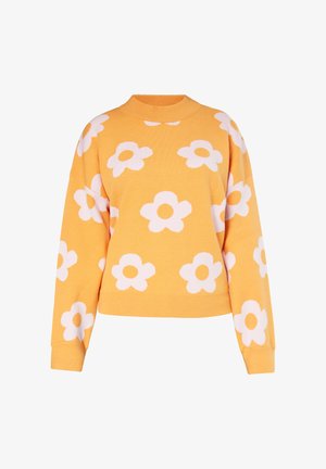 Maglione giallo con collo alto, caratterizzato da grandi motivi floreali bianchi, texture morbida e polsini e orlo a costine.