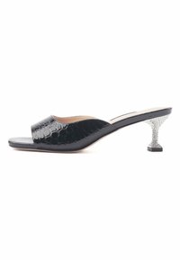 Black open-toe mules with a glossy finish, featuring a unique textured pattern and a sparkling crystal-embellished block heel.