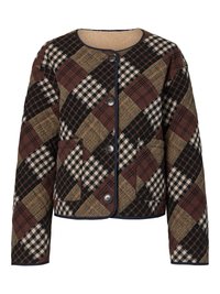 Quilted jacket featuring a brown, black, and cream plaid pattern, round neckline, two front pockets, and dark trim with button closures.