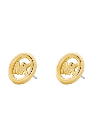 Boucles d'oreilles à clou en ton doré présentant un design circulaire avec un logo "MK" gravé au centre. Fini lisse avec une texture polie.