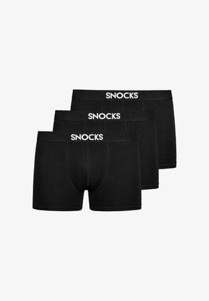 Drei schwarze Boxershorts für Herren übereinandergestapelt, jeweils mit weißem "SNOCKS"-Logo am Bund, vordere Naht sichtbar, einfarbiger Hintergrund.