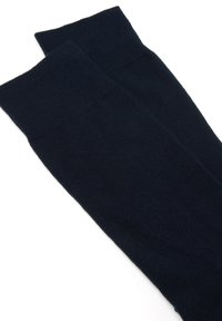 Calze alte fino al ginocchio di colore blu scuro, con trama a maglia, dotate di una banda superiore a coste. Finitura liscia senza motivi visibili o dettagli in metallo.