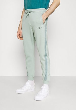 ASTRA WRAP SW PANT - Tracksuit bottoms - blue