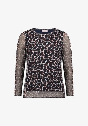 Haut à manches longues avec imprimé animalier noir et blanc irrégulier, manches en tulle transparent et ourlet, encolure ronde et silhouette ajustée.