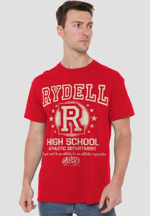 Red cotton t-shirt featuring "RYDELL HIGH SCHOOL" text and logo with distressed white print and stars, round neckline, short sleeves.