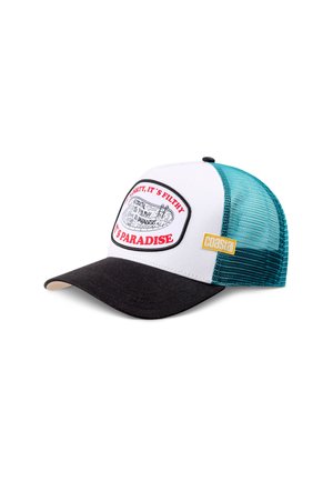 Gorra trucker de malla blanca y verde azulado con visera negra, parche frontal que dice "ES SUCIO, ES INMUNDO, ES PARAÍSO" y etiqueta amarilla "coastal".