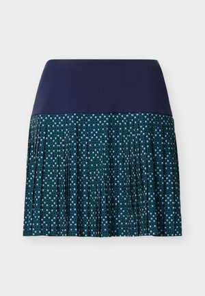 Marineblå kvindeskørt med en bred, ensfarvet linning og en plisseret nedre del med mønster i grønblå og lyseblå geometriske former.