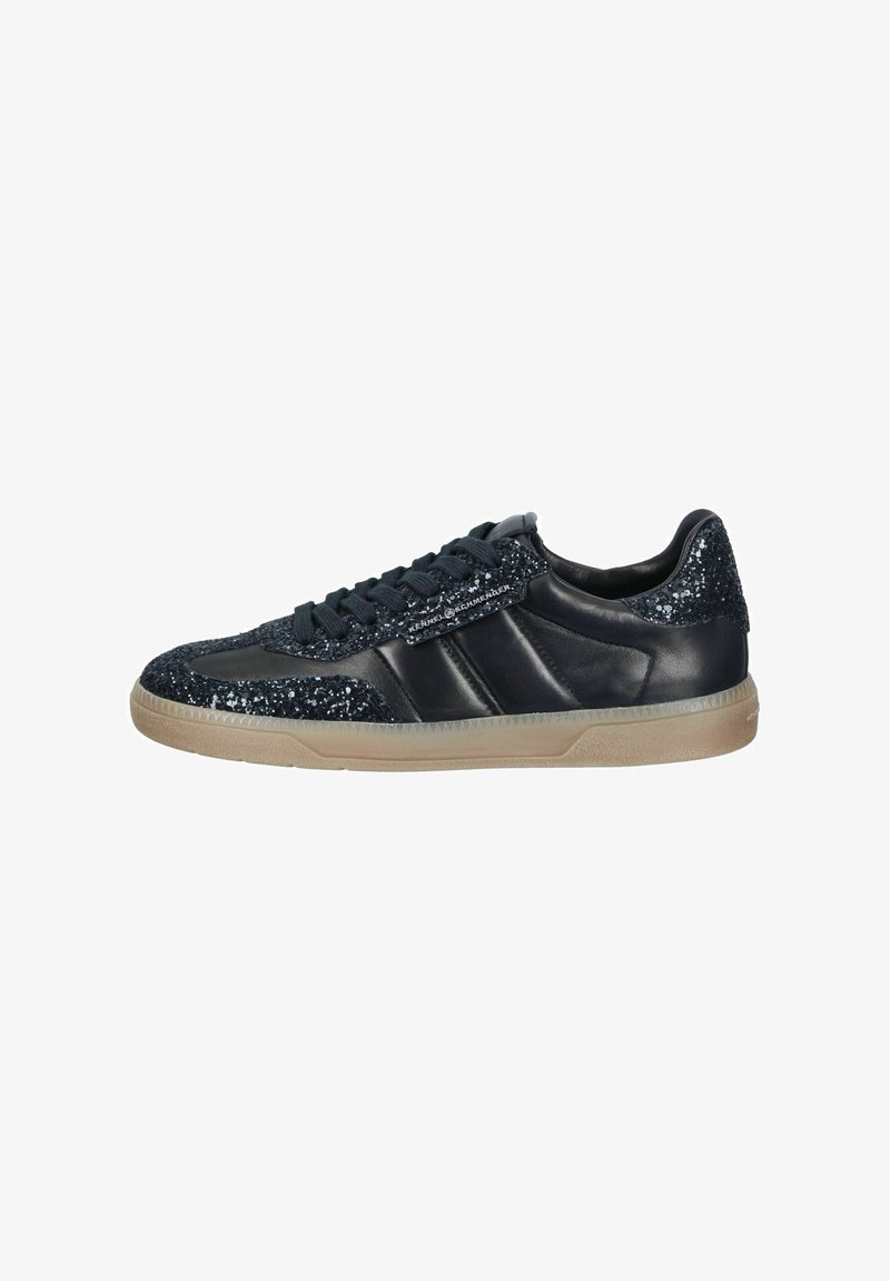 Black sneakers with glitter accents, smooth leather sections, and a gum rubber sole, featuring a lace-up design and textured upper.