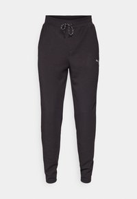 Zwarte joggingbroek van zachte stof, met een elastische tailleband met trekkoord, zijzakken en een klein logo op de linkerdij.
