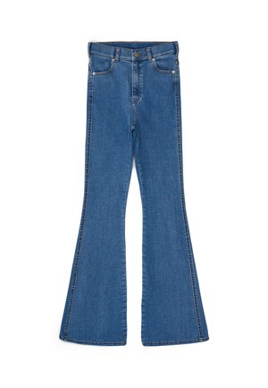 Flared blue jeans made from denim, featuring a classic waist, two front pockets, and contrasting stitching along the seams.