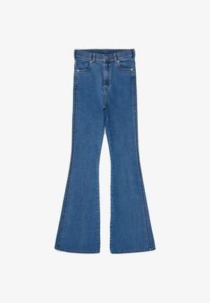 Flared blue jeans made from denim, featuring a classic waist, two front pockets, and contrasting stitching along the seams.