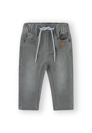 Pantalones de mezclilla gris con cintura elástica, cordón ajustable, diseño de cinco bolsillos y un pequeño logo de oso marrón como acento.