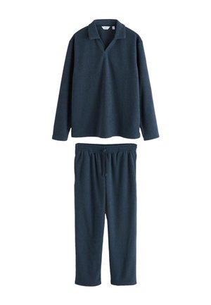 Ensemble de détente bleu marine deux pièces avec haut col à manches longues et pantalon à taille élastique avec cordon, fabriqué en tissu doux et texturé.