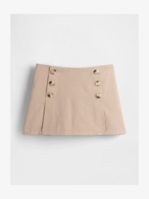 Beige cotton skirt with a straight cut, featuring four large brown buttons on the left side and a flat hem at the bottom.