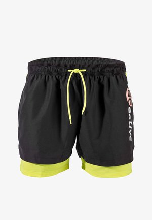 Black swim shorts with a neon yellow drawstring and lower hem. Features logo in white on the side and contrasting neon yellow lining.