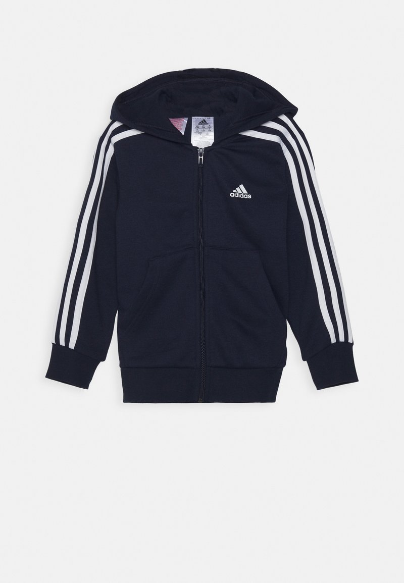 Sudadera con cremallera azul marino en mezcla de algodón. Cuenta con tres rayas blancas en las mangas y un logo en la parte delantera. Incluye bolsillos canguro y capucha con cordón.