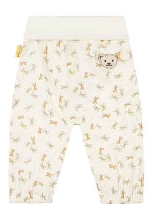 Pantaloni chiari in crema con un delicato motivo floreale in arancione e verde. Vita elasticizzata morbida e polsini arricciati. Dettaglio a topolino sullo sfondo.