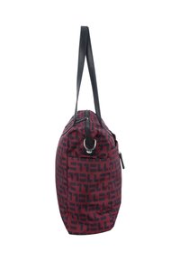 Maroon rectangular handbag with black geometric pattern, black leather dual handles, and zipper closure on top, shown from side angle.