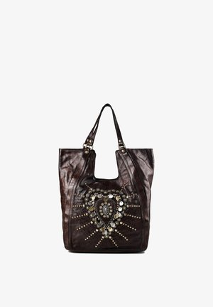 Sac cabas en cuir marron foncé avec deux anses et des clous métalliques décoratifs en forme de cœur ainsi que des ornements ronds au centre devant.