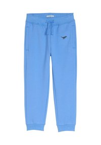 Ljusblå joggingbyxor i mjukt material, med ett elastiskt midjeband och snörning, sidofickor och en liten svart logotyp.