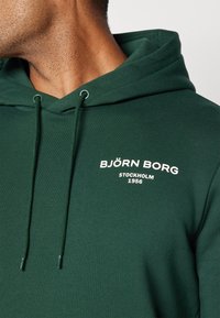 Björn Borg ESSENTIAL HOODIE - Džemperis su gobtuvu - pine grove