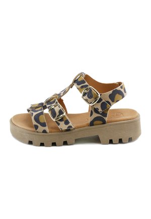 Sandalia con estampado de leopardo, dos hebillas ajustables, plantilla acolchada de color marrón claro y suela gruesa de goma con tacos profundos para un buen agarre.