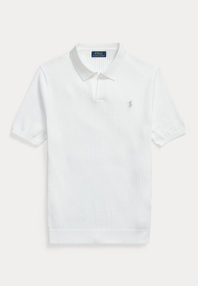 White ribbed polo shirt with a classic collar, short sleeves, and an embroidered logo on the left chest. Soft texture and clean design.