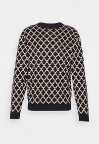 Maglione lavorato a maglia con motivo geometrico in blu navy e beige, con scollo rotondo e polsini e orlo a costine.