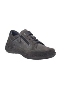 Sneaker in suede grigia con punta rotonda, lacci a contrasto, zip laterale e dettagli cuciti per una texture migliorata. Suola in gomma per una migliore aderenza.