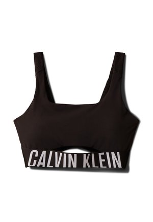 Top desportivo preto com decote quadrado e alças largas. Apresenta uma parte superior texturizada e um logótipo em branco "CALVIN KLEIN" contrastante na faixa.