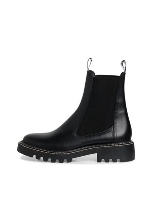 Schwarze Leder-Chelsea-Boots mit elastischen Seiteneinsätzen, Zuglaschen, robustem Gummisohle und Kontrastnähten entlang der Kante.