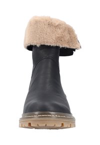 Bottines noires en cuir avec un revers en fausse fourrure beige, semelle plate en caoutchouc et motif de semelle texturé pour une meilleure adhérence. Aucun accent matériel visible.