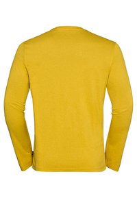 Long-sleeve mustard yellow shirt shown from the back with a crew neckline and a small black tag on the left side seam.