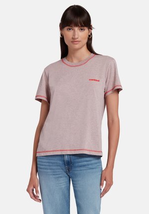 Lichtroze t-shirt met korte mouwen, voorzien van rode stiksels en het logo "mankind" op de borst. Zachtheid van de stof,Relaxte pasvorm en ronde hals.