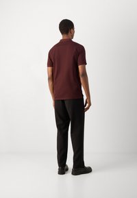 Antony Morato SLIM FIT WITH RUBBER INJECTION PRINT PATCH EFFECT - Poloshirts - dark cherry